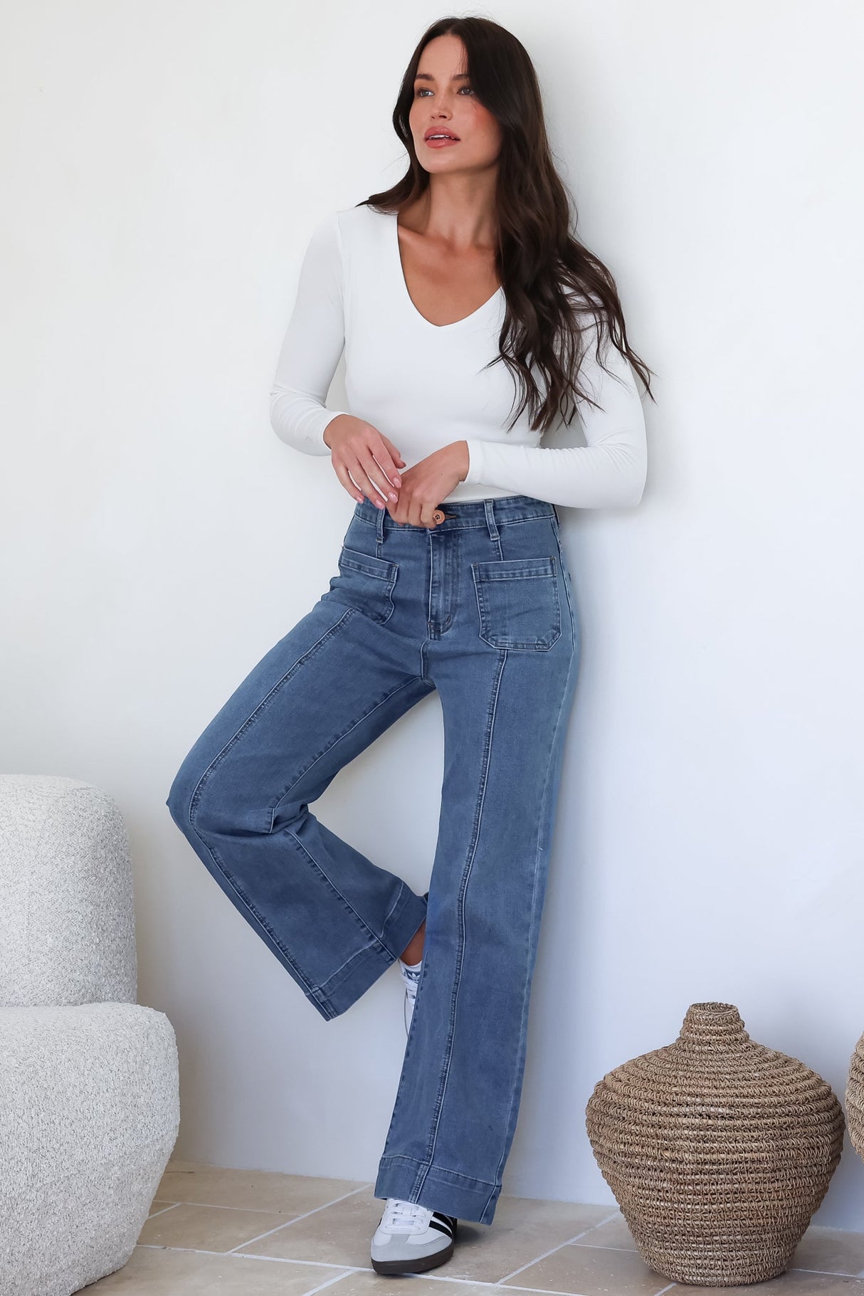 Model wearing Marsha Jeans in Mid Denim Wash from Salty Crush