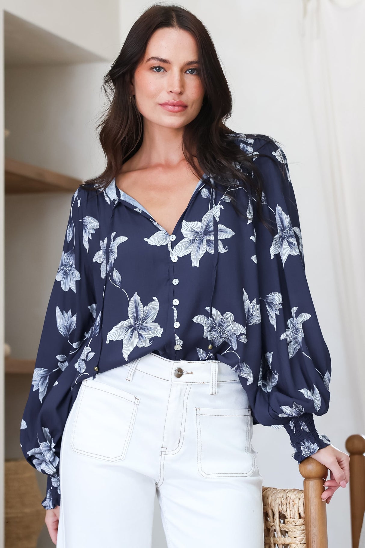 Model wearing Moree Blouse in Midnight Lily Print from Salty Crush