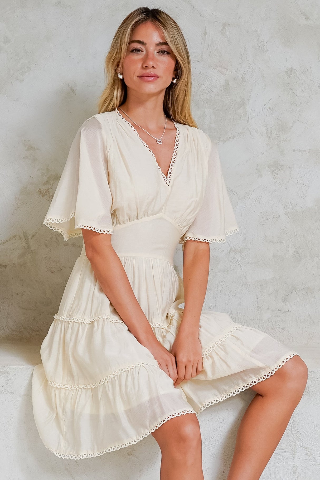 Nessie Mini Dress - Lace Trim Tiered Dress with Flutter Sleeves in Cream