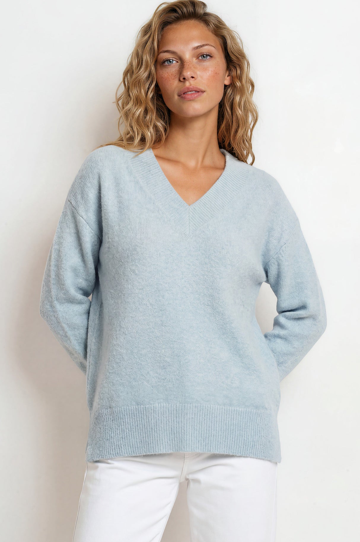 Model wearing Nikita Jumper in Blue from Salty Crush