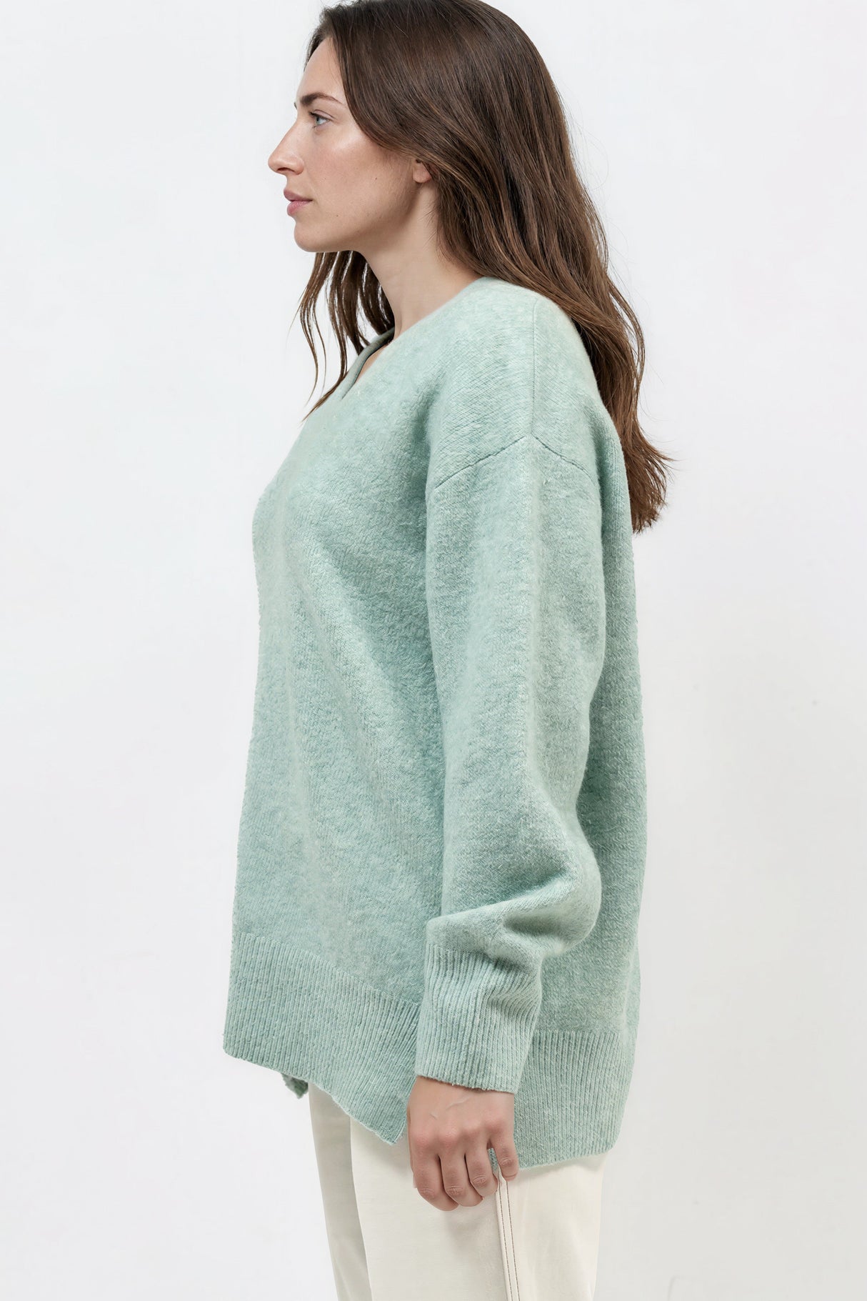 Model wearing Nikita Jumper in Green from Salty Crush