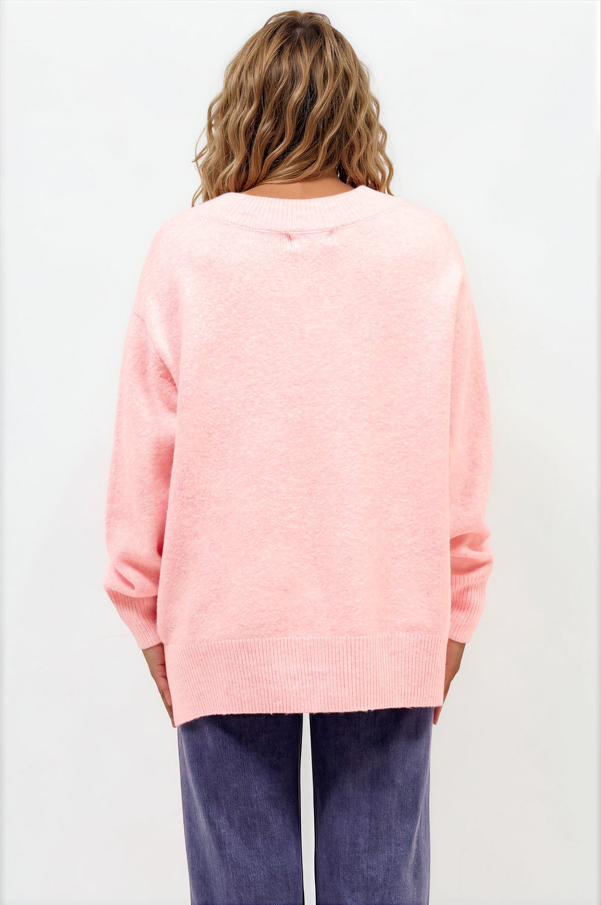 Model wearing Nikita Jumper in Pink from Salty Crush