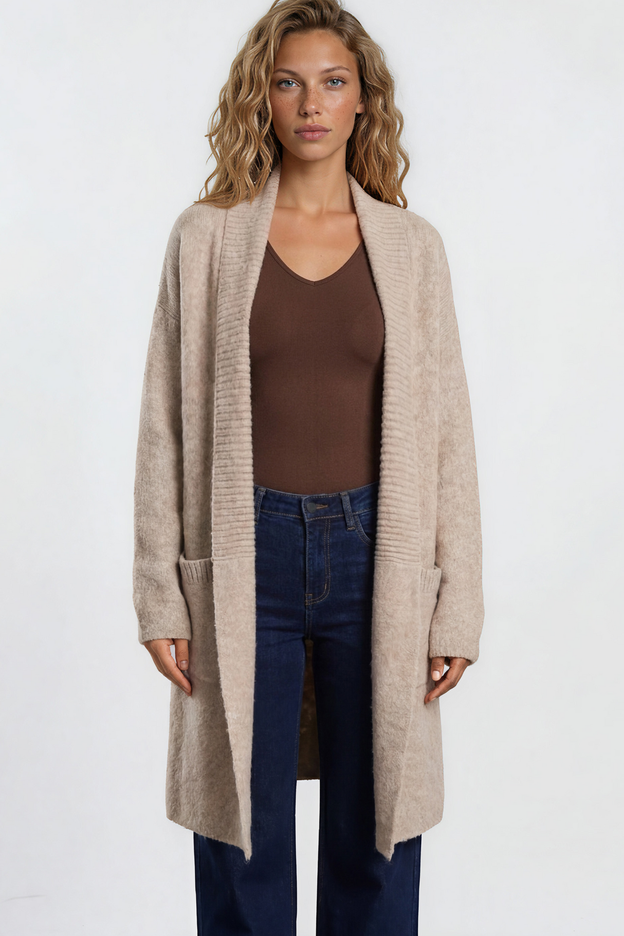 Model wearing Oswin Cardigan in Beige from Salty Crush