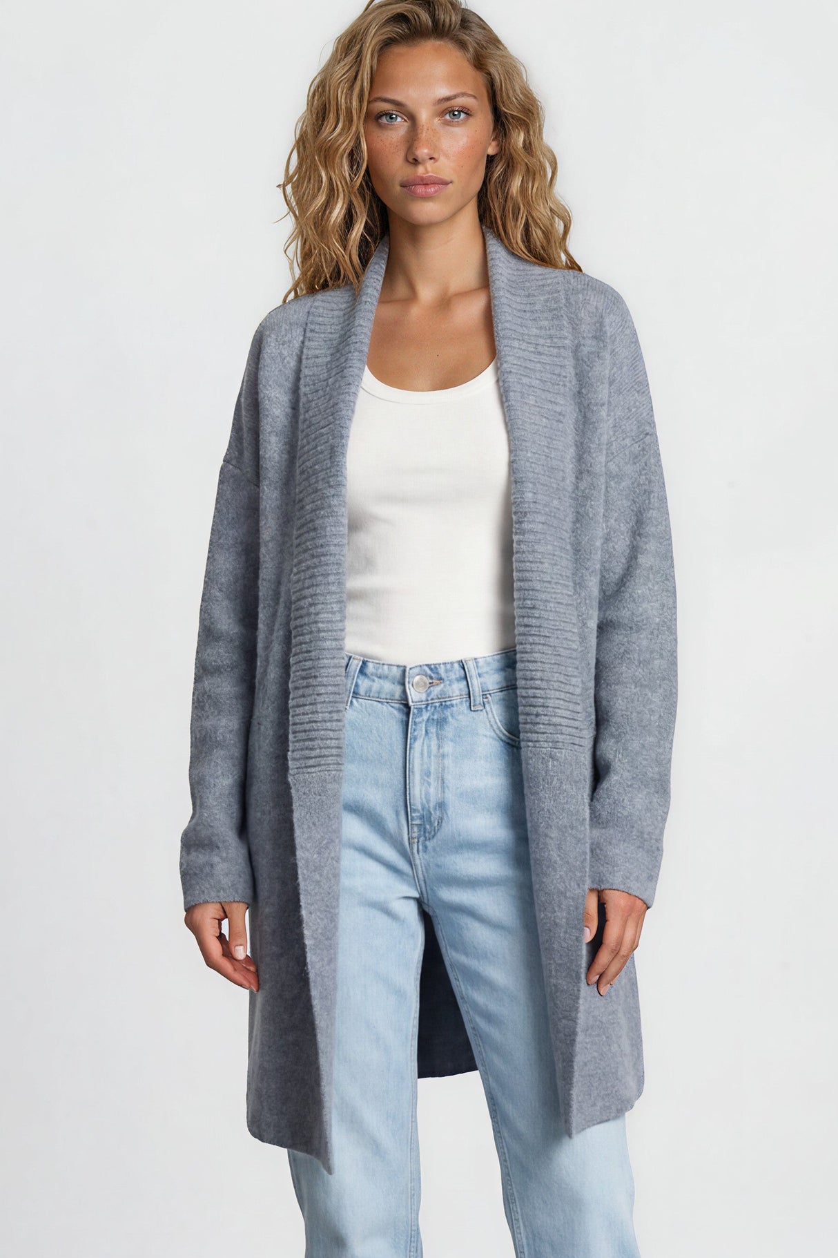 Model wearing Oswin Cardigan in Blue from Salty Crush