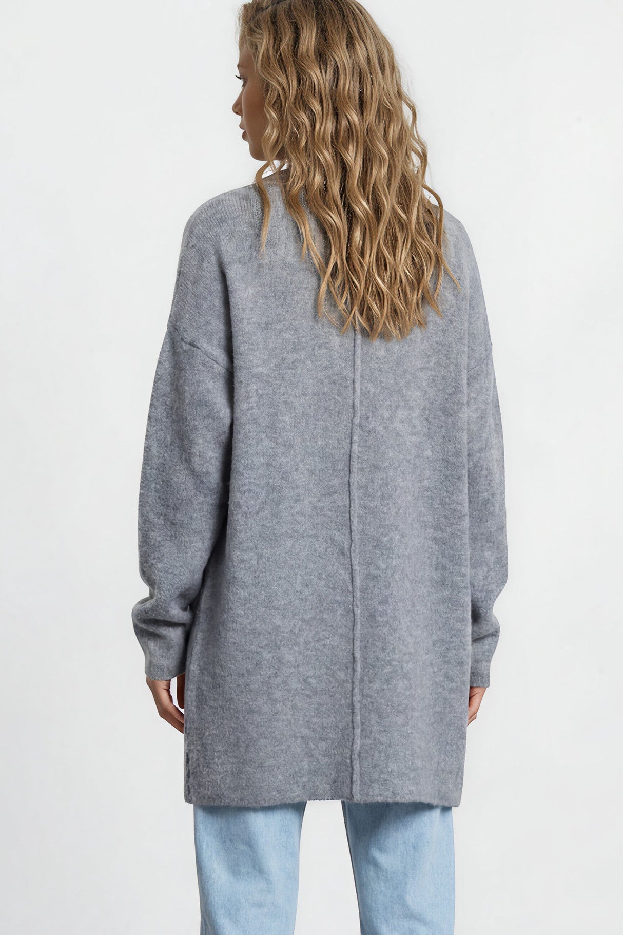 Model wearing Oswin Cardigan in Blue from Salty Crush