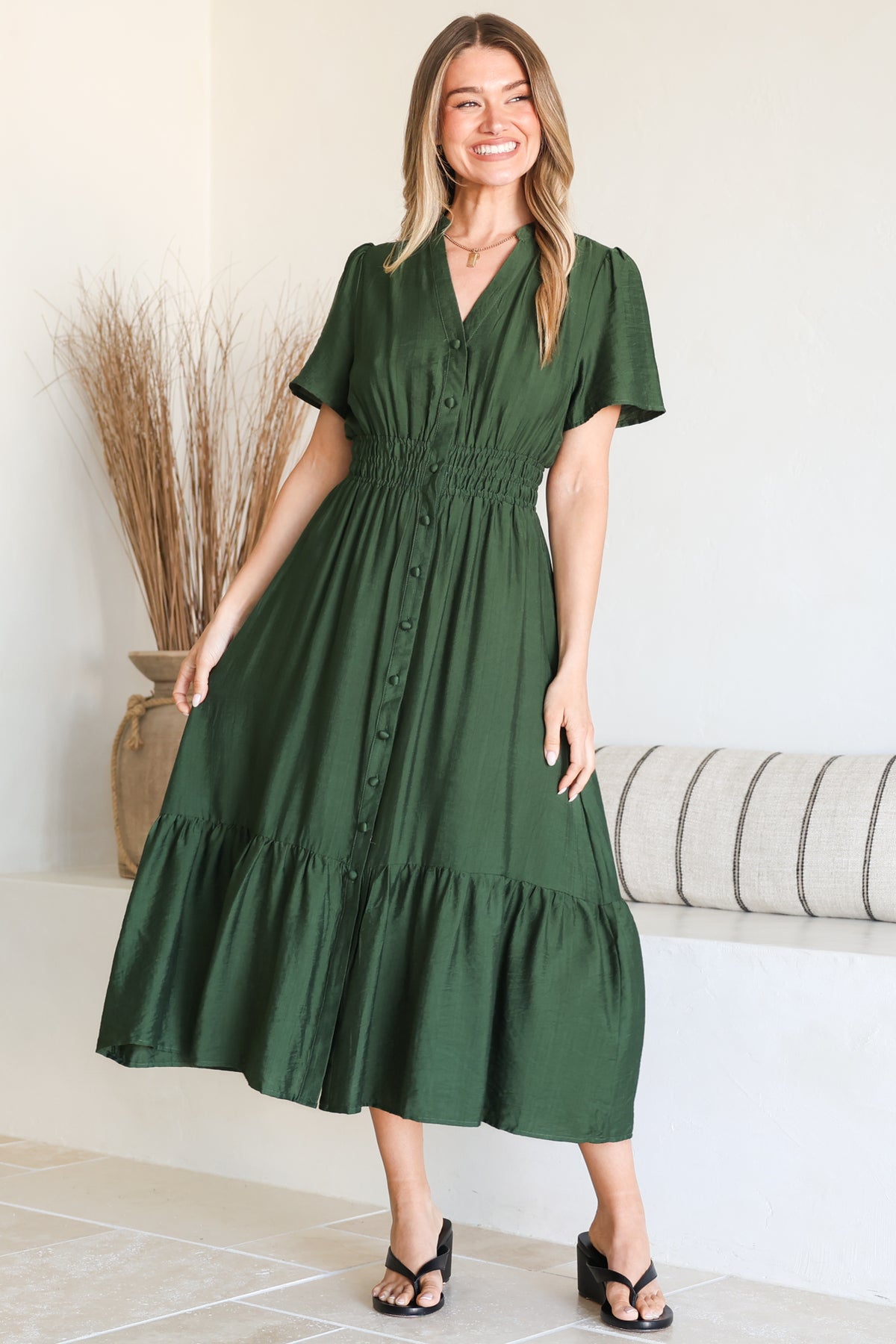 Model wearing Paloma Midi Dress in Emerald from Salty Crush