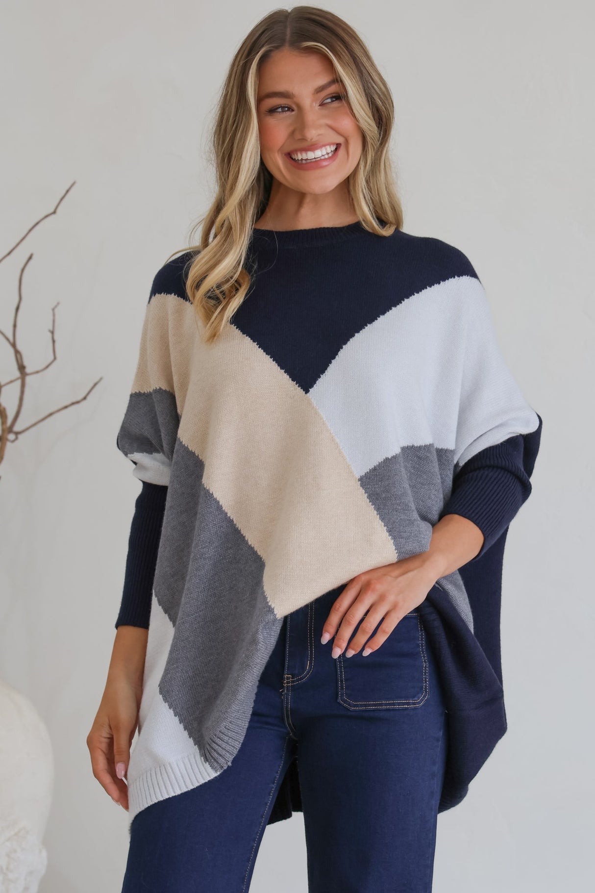 Model wearing Reed Jumper in Navy from Salty Crush