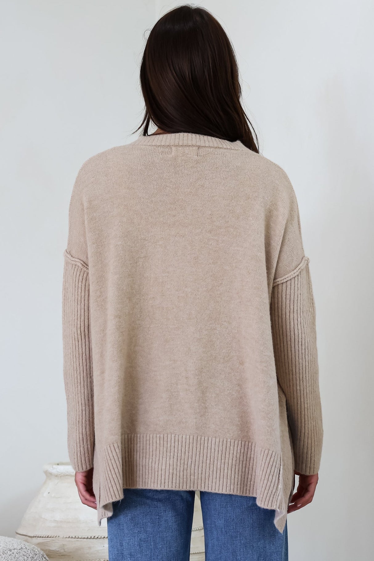 Ridge Jumper - V Neck Relaxed Shark Bite Ribbed Hemline Knit in Beige
