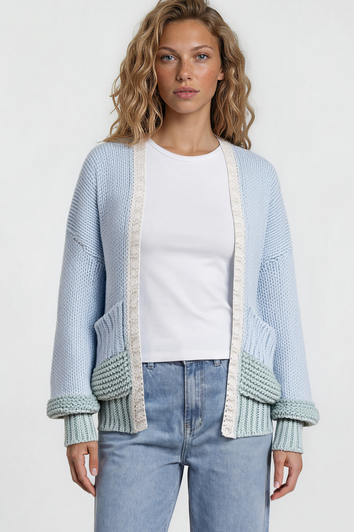 Model wearing Rosie Cardigan in Blue/Green from Salty Crush