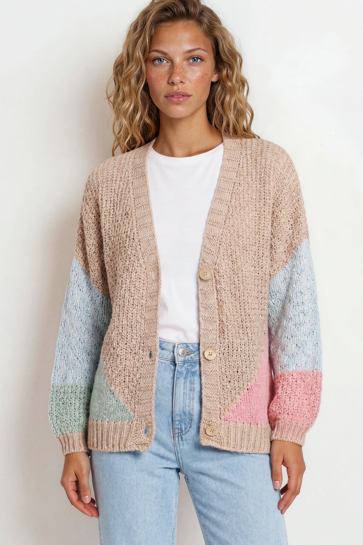 Model wearing Rubina Cardigan in Beige/Pink from Salty Crush
