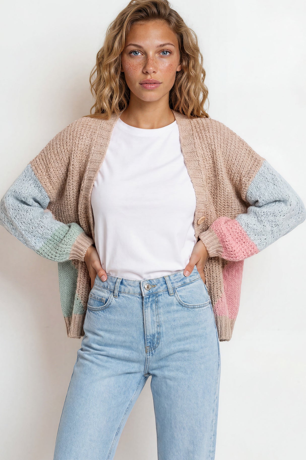 Model wearing Rubina Cardigan in Beige/Pink from Salty Crush