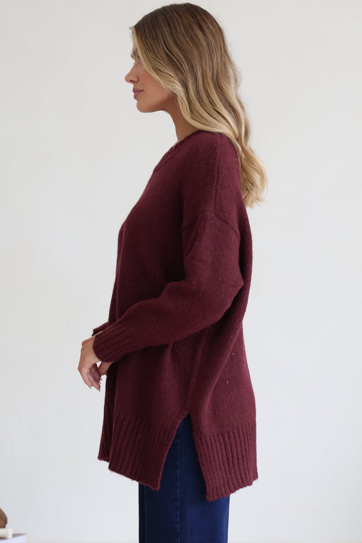 Sammy Jumper - Crew Neck Ribbed Shark Bite Hemline Jumper in Wine
