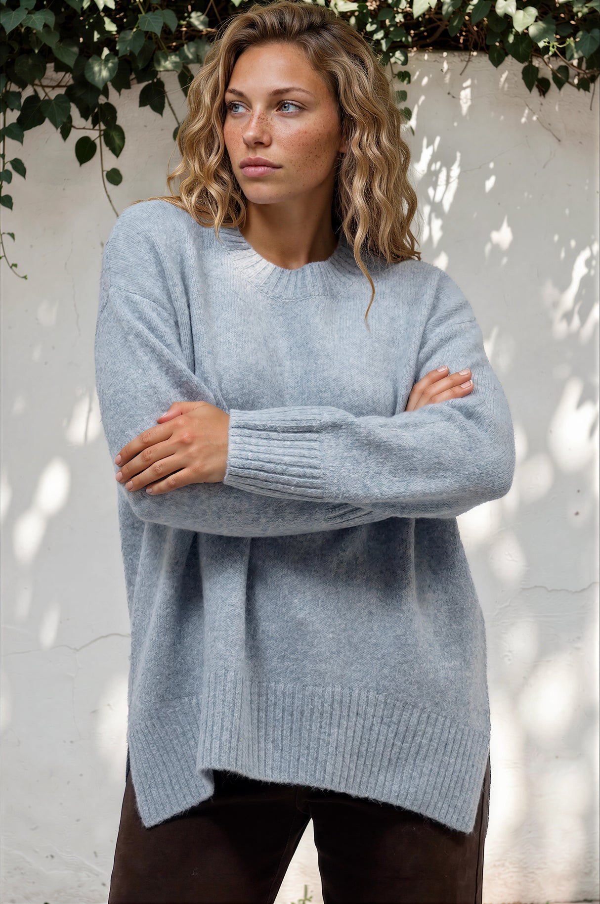 Model wearing Sandro Jumper in Blue from Salty Crush