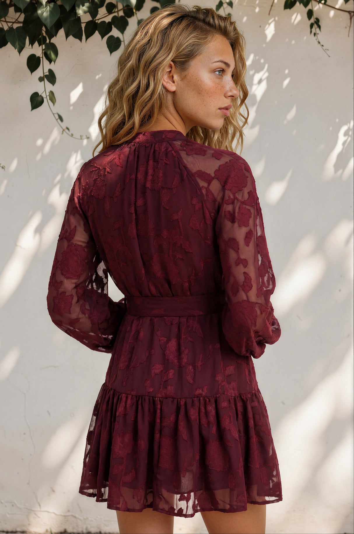 Model wearing Solange Mini Dress in Wine from Salty Crush