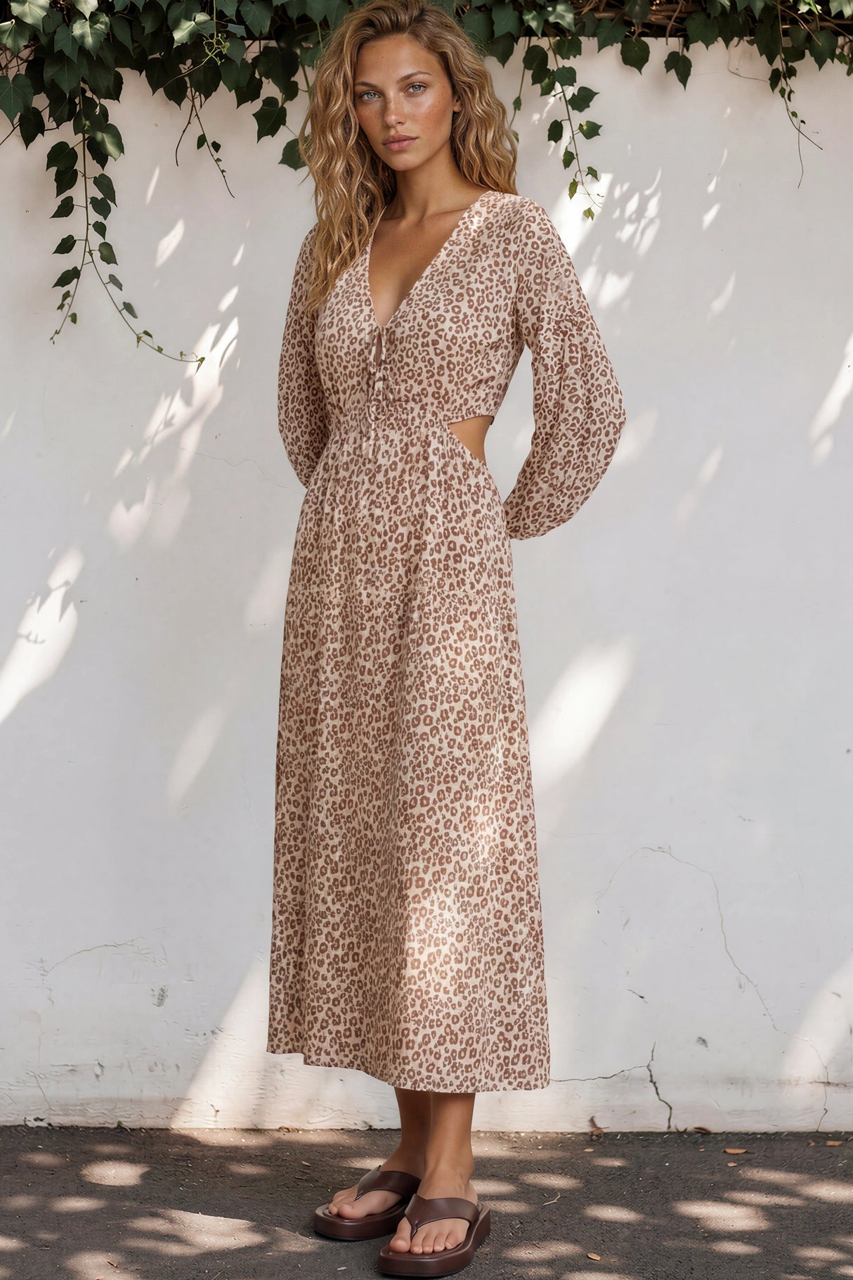 Model wearing Sona Midi Dress in Leo Lily Print from Salty Crush