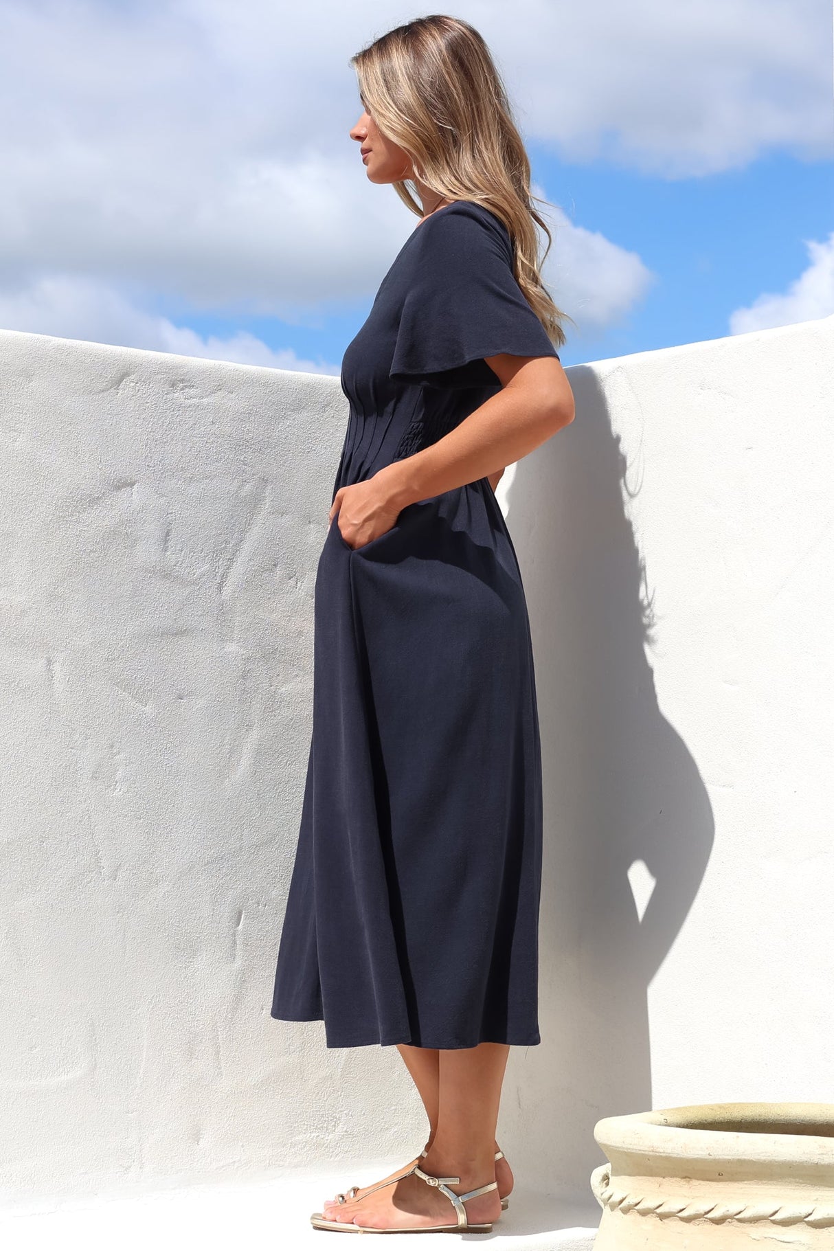 Stellar Midi Dress - Flutter Sleeve A-Line Dress with Pin Tuck Waist Detail in Navy