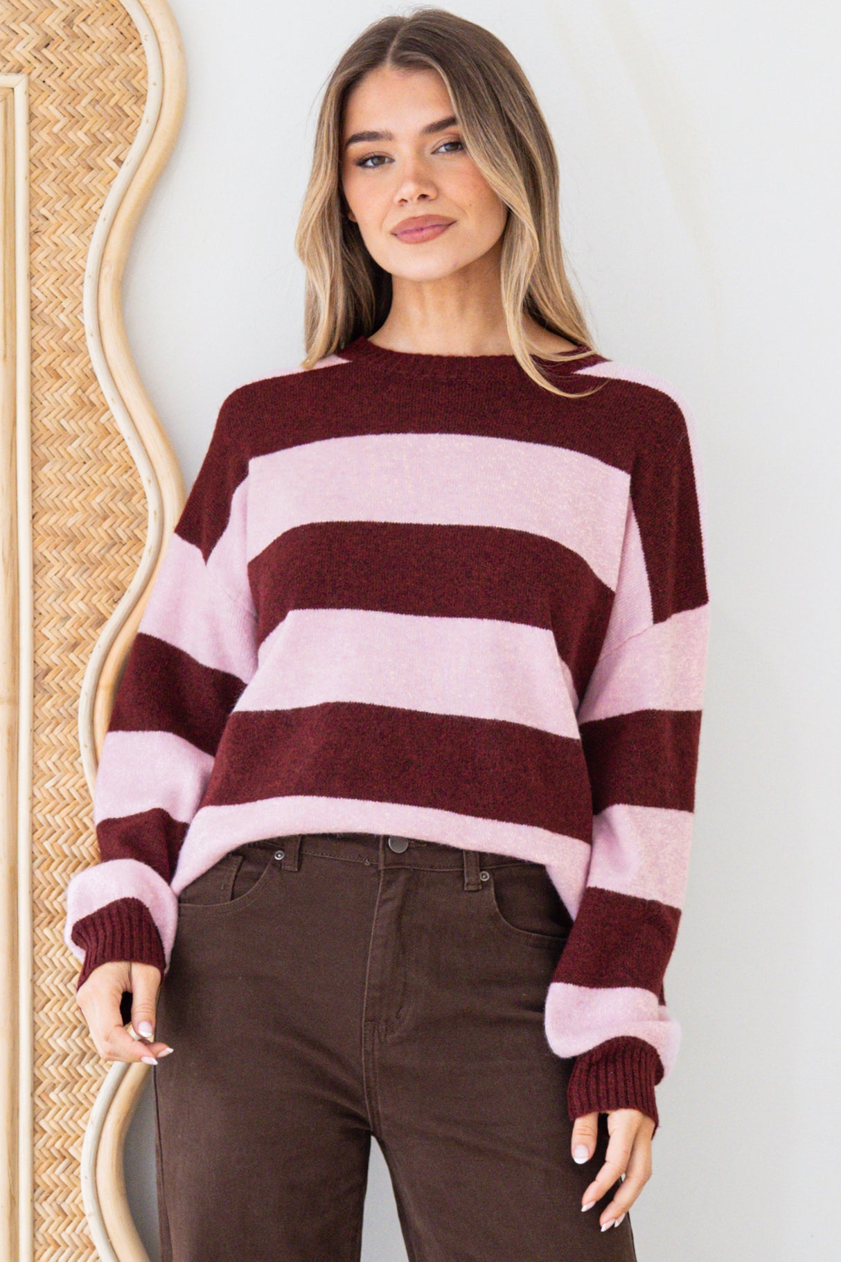 Model wearing Sumner Jumper in Wine/Pink from Salty Crush