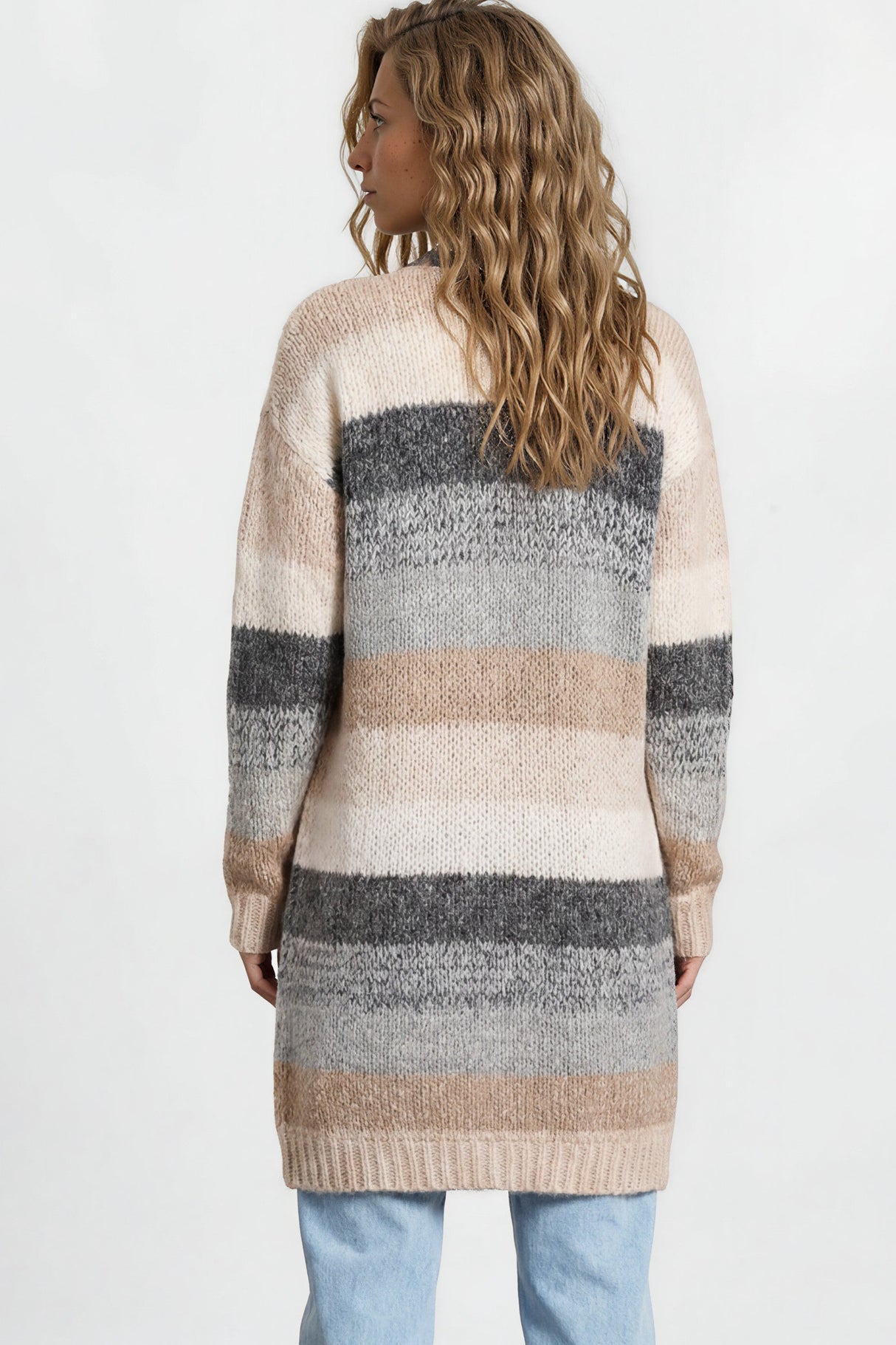 Model wearing Tess Cardigan in Beige from Salty Crush