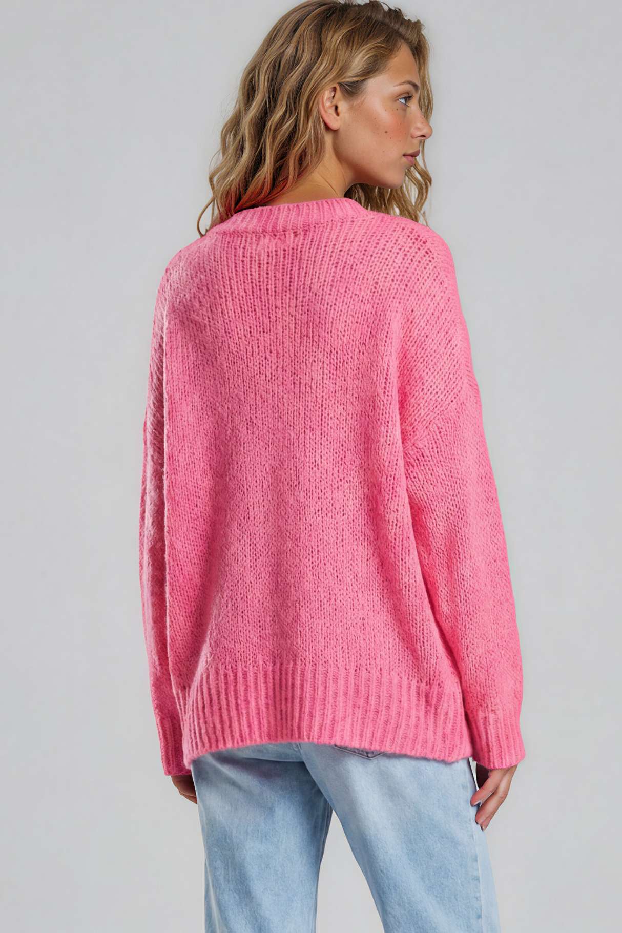 Model wearing Thorne Jumper in Hot Pink from Salty Crush