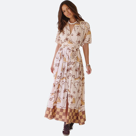 Model wears a bohemian maxi dress