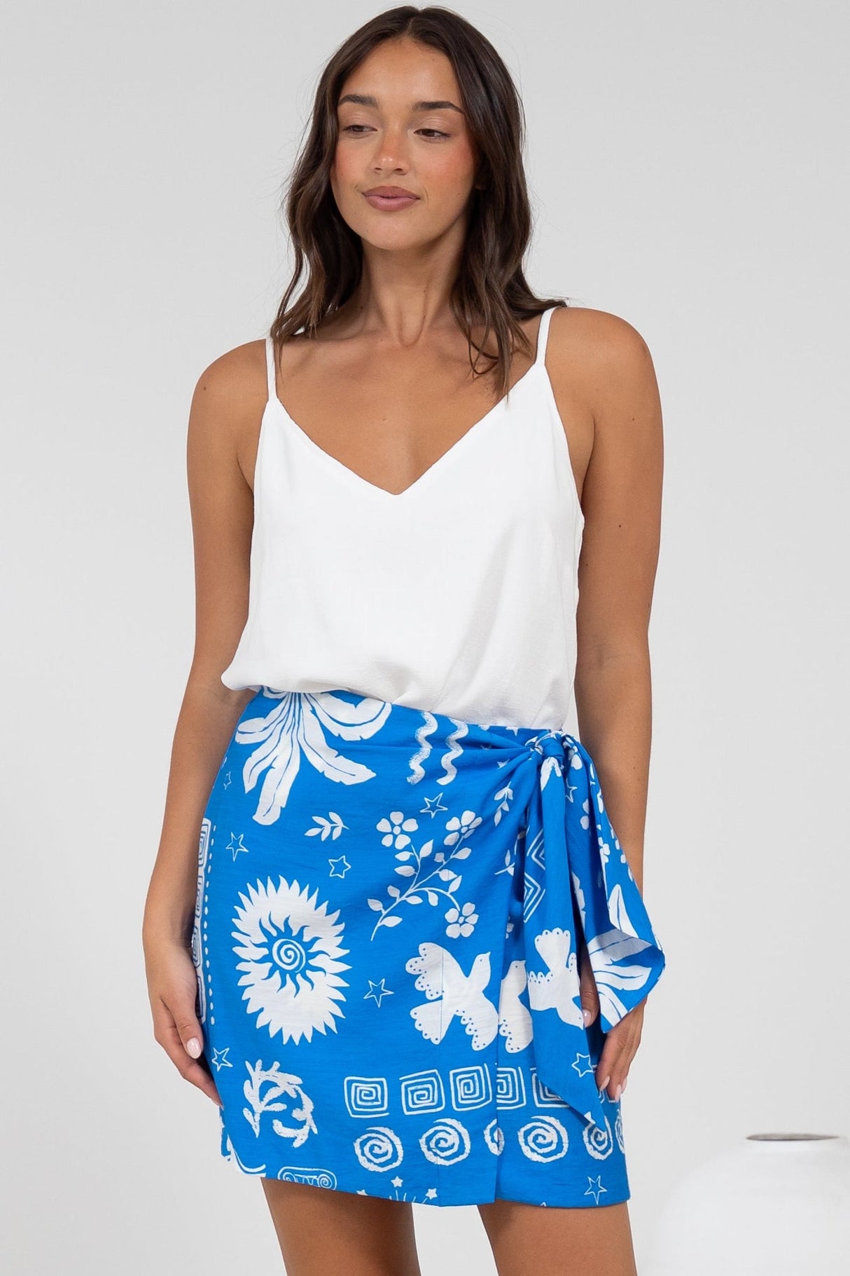 Sassi Mini Skirt - High Waisted Skirt with Wrap Belt in Aurie Print