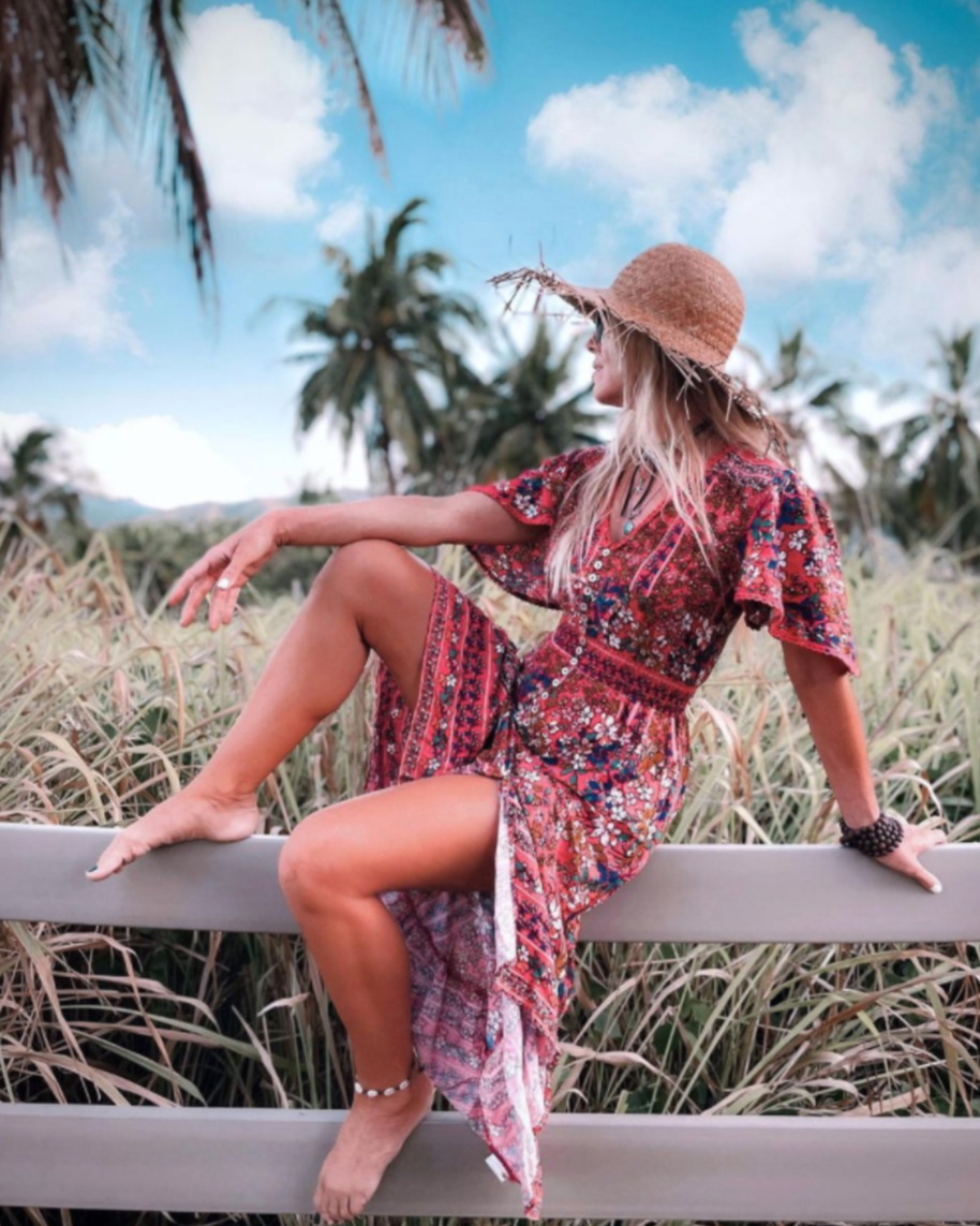 Young woman models a Salty Crush dress
