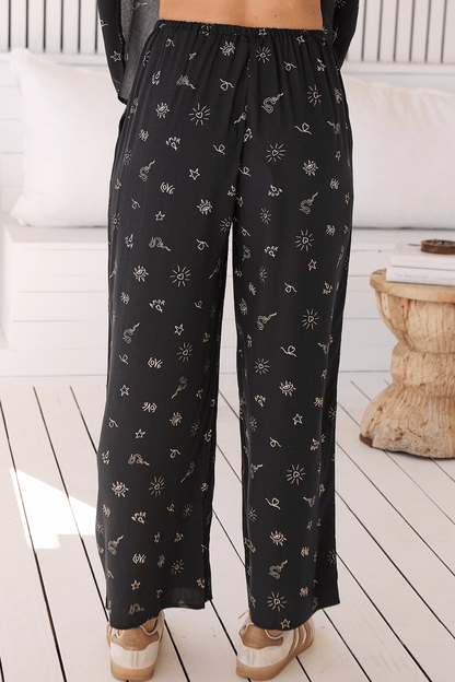 JAASE - Cici Pants: Mid Rise Relaxed Wide Leg Pant in Love Is All Round Print