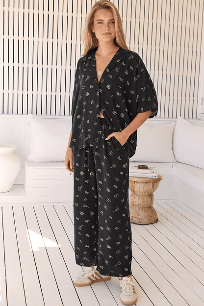 JAASE - Cici Pants: Mid Rise Relaxed Wide Leg Pant in Love Is All Round Print