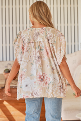 JAASE - Fisico Top: High V Neck Slouchy Blouse with Crochet Trim Hemline in Empire Print