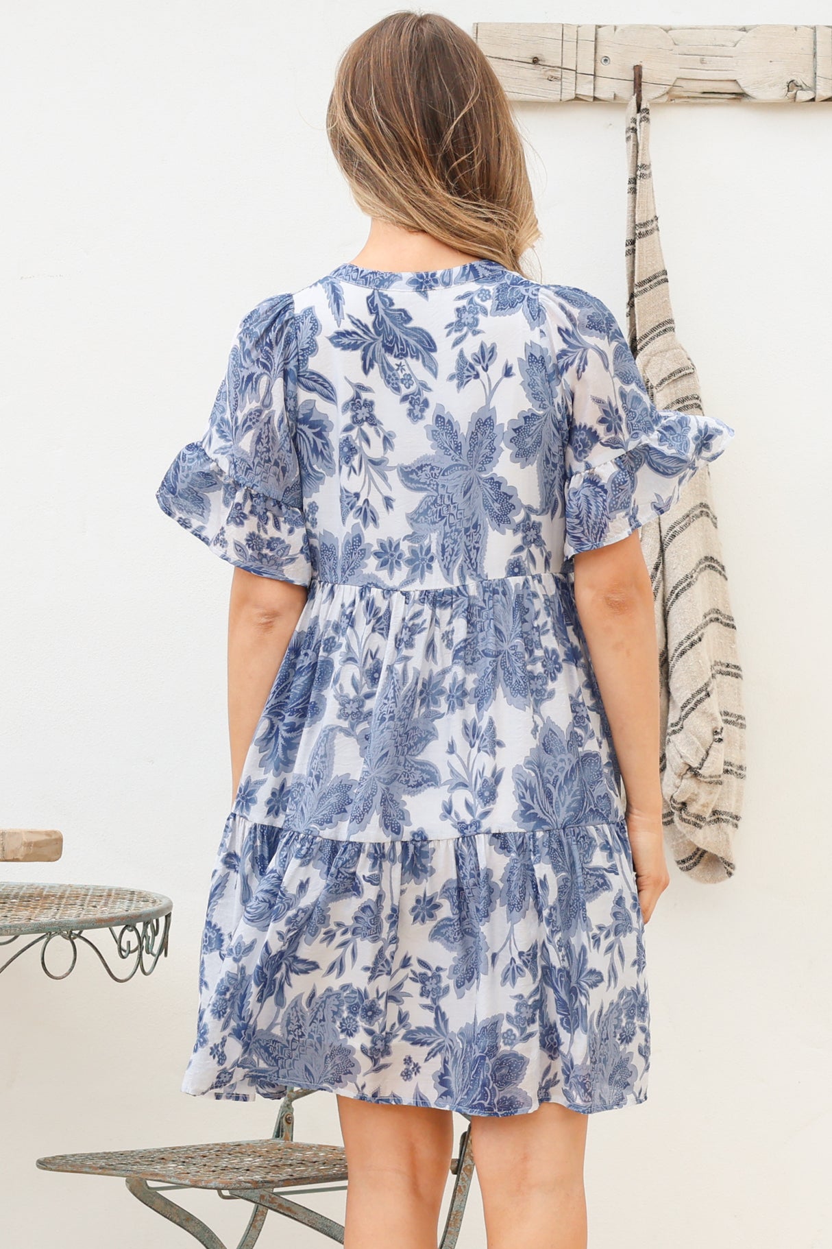 Model wearing Abilia Mini Dress in Izaria Print Blue from Salty Crush