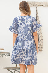 Model wearing Abilia Mini Dress in Izaria Print Blue from Salty Crush