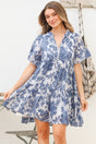 Model wearing Abilia Mini Dress in Izaria Print Blue from Salty Crush