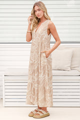 Model wearing Acelle Midi Dress in Jeani Print Beige from Salty Crush