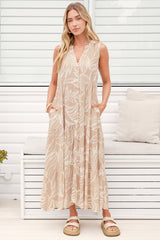 Model wearing Acelle Midi Dress in Jeani Print Beige from Salty Crush