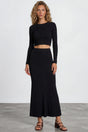 Model wearing Ada Maxi Skirt in Black from Salty Crush