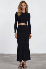 Model wearing Ada Maxi Skirt in Black from Salty Crush
