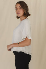 Adria Top - Frill High-Low Hem with Wooden Button Down Back Top in Oat