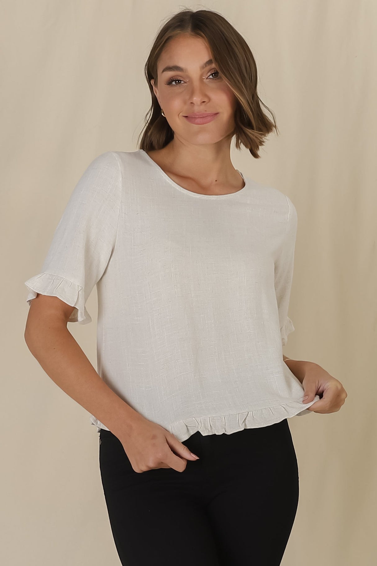 Adria Top - Frill High-Low Hem with Wooden Button Down Back Top in Oat