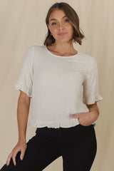 Adria Top - Frill High-Low Hem with Wooden Button Down Back Top in Oat