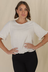 Adria Top - Frill High-Low Hem with Wooden Button Down Back Top in Oat