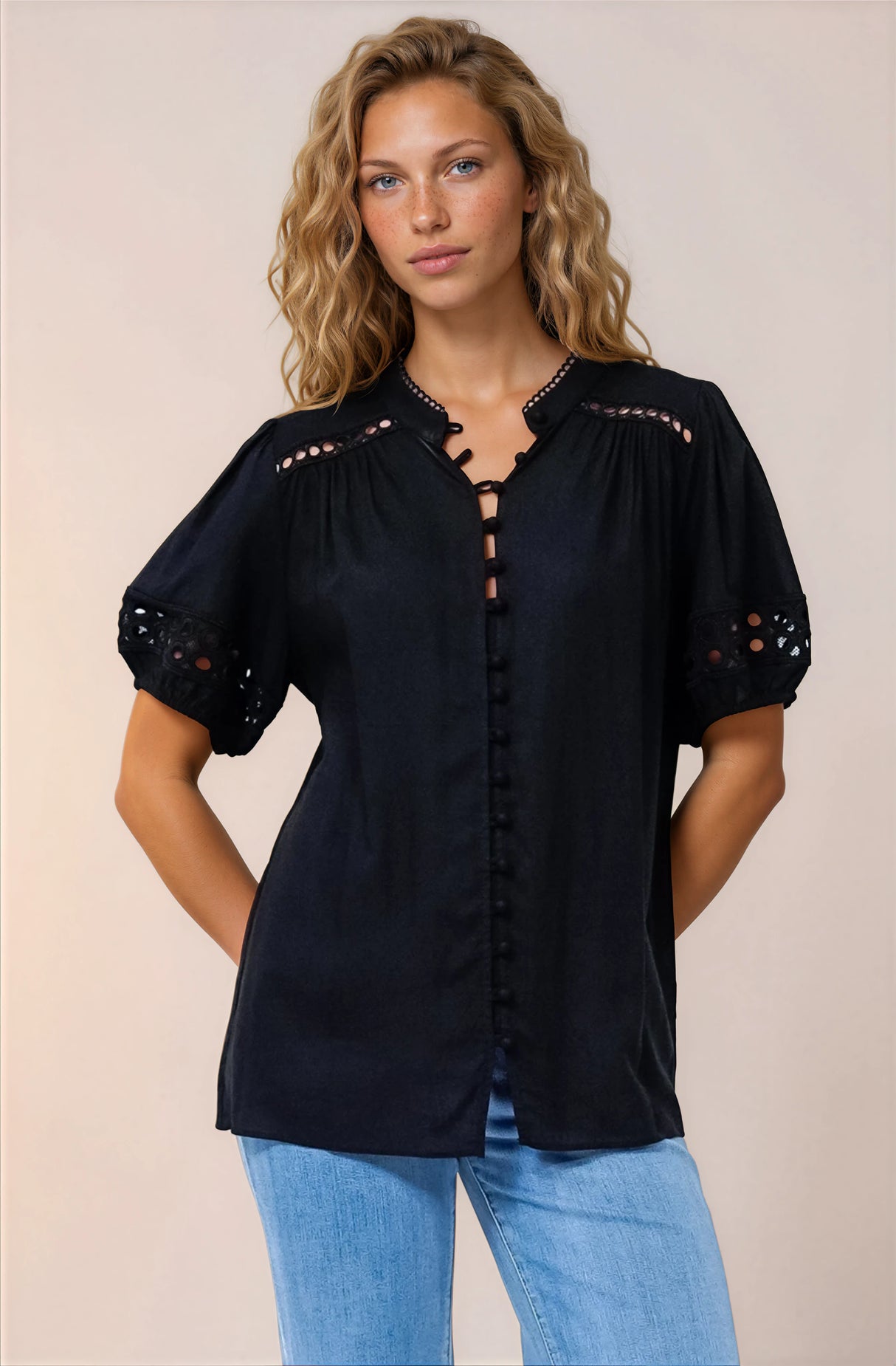 Model wearing Alenna Shirt in Black from Salty Crush