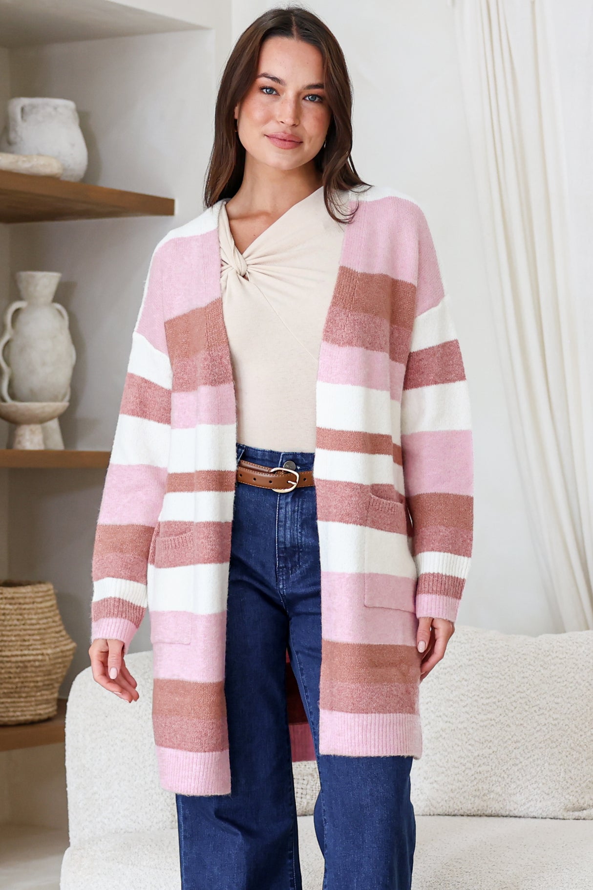Model wearing Alfie Cardigan in Pink from Salty Crush