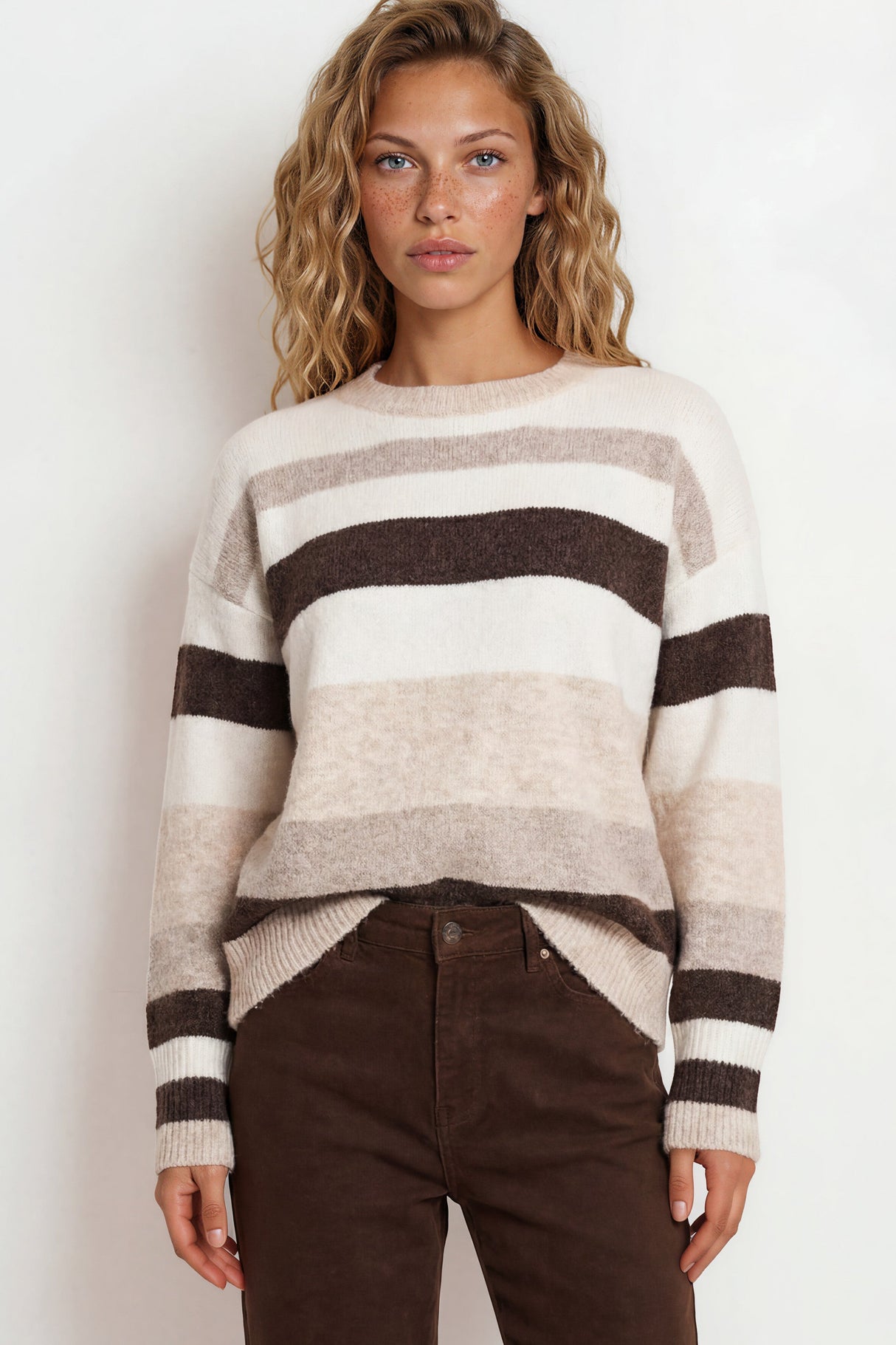 Model wearing Alfie Jumper in Beige from Salty Crush