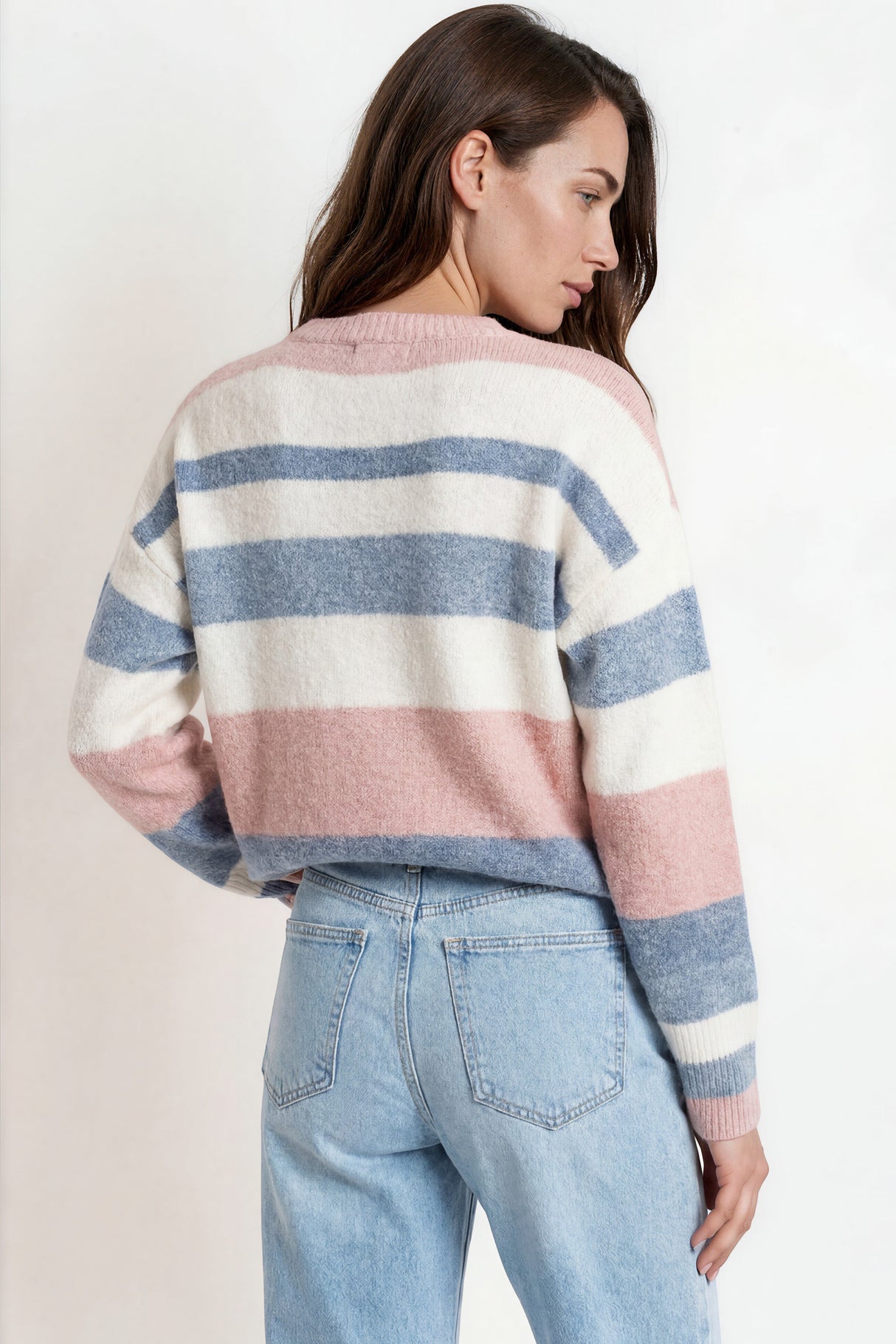 Model wearing Alfie Jumper in Blue from Salty Crush