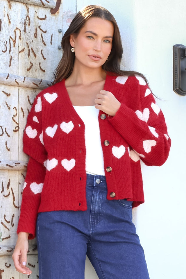Model wearing Allaria Cardigan in Red from Salty Crush