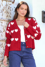 Model wearing Allaria Cardigan in Red from Salty Crush