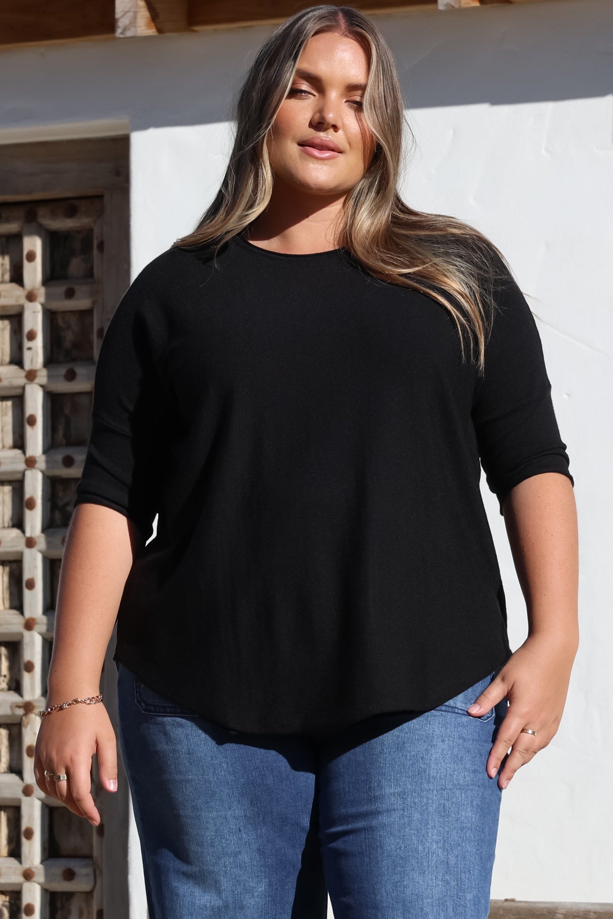 Allegra Knit Top - Crew Neck Curved Hem Box Silhouette Top in Black