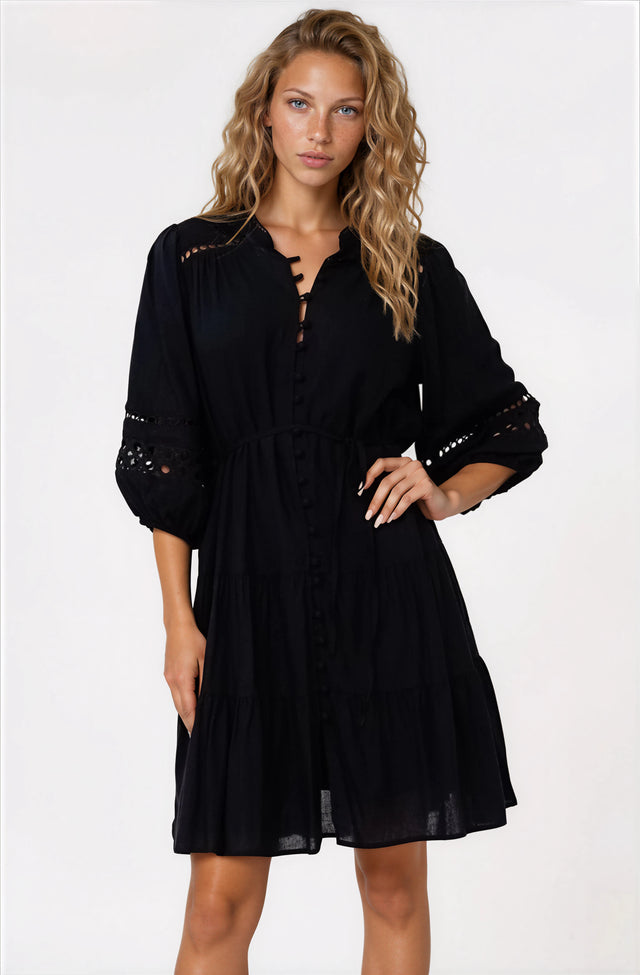 Model wearing Alyce Mini Dress in Black from Salty Crush