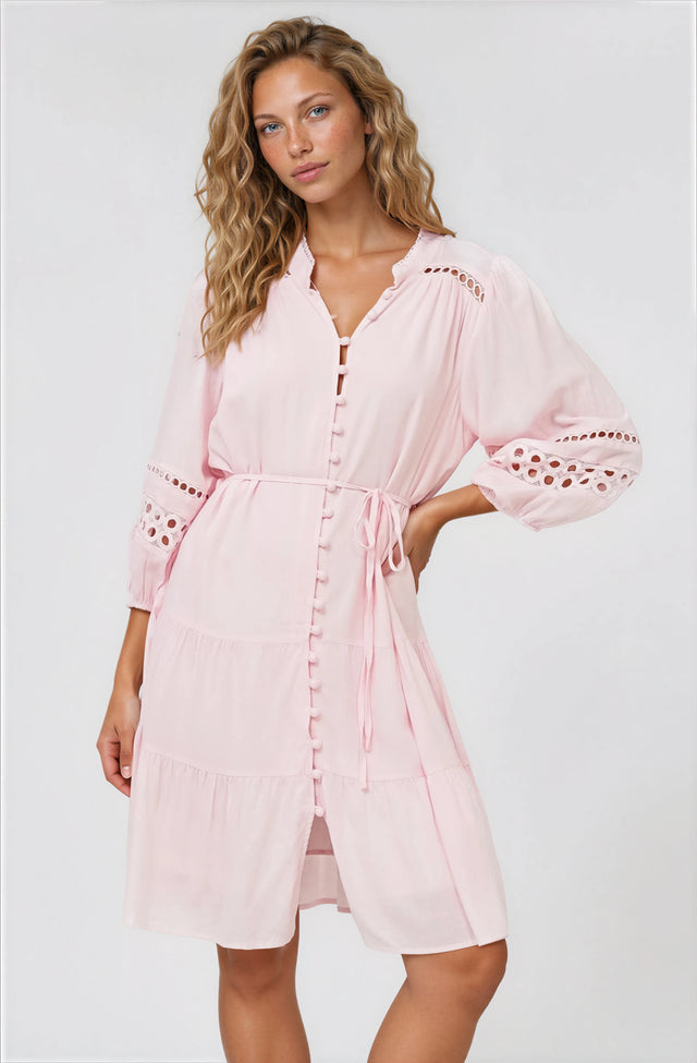 Model wearing Alyce Mini Dress in Pink from Salty Crush in a white background