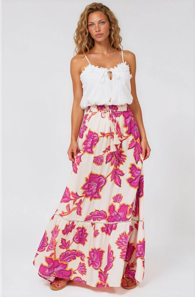 A woman smiling wearing Amana Maxi Skirt in Kaila Print Cream from Salty Crush 